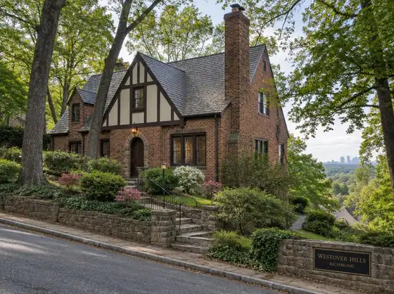 A brick Tudor on a wooded street in Westover Hills.