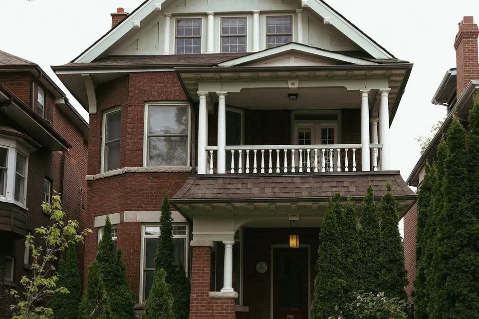 Front of the house, with the two-story porch, 2214 Floyd Ave, Richmond