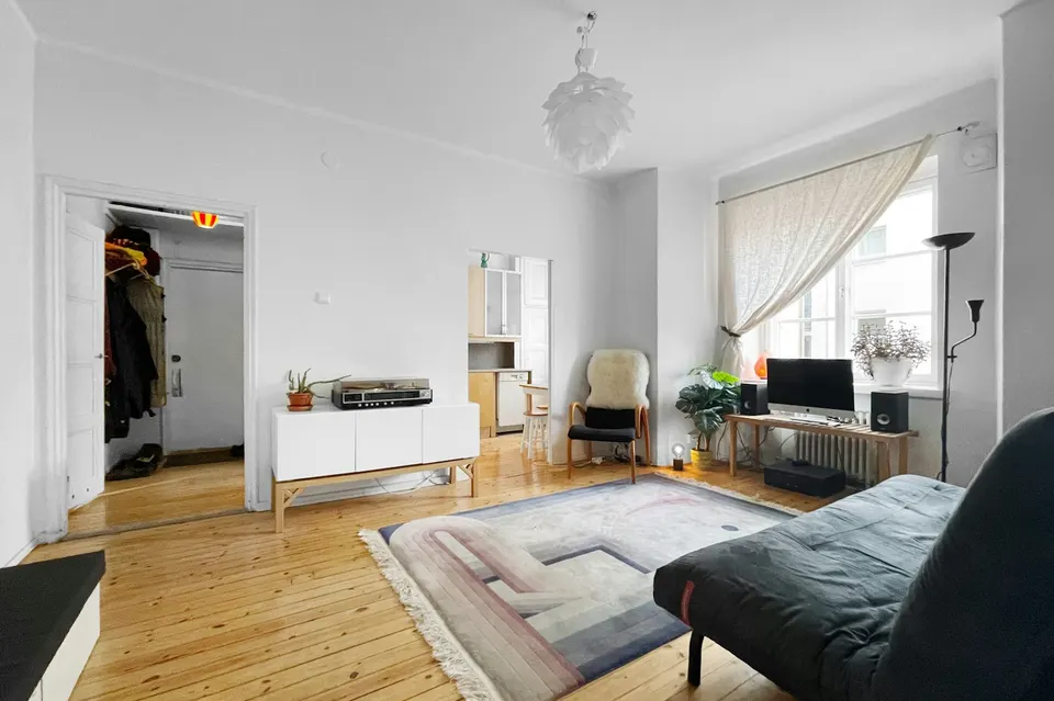 Living room, original pine floors and tall windows, 2214 Floyd Ave, Richmond